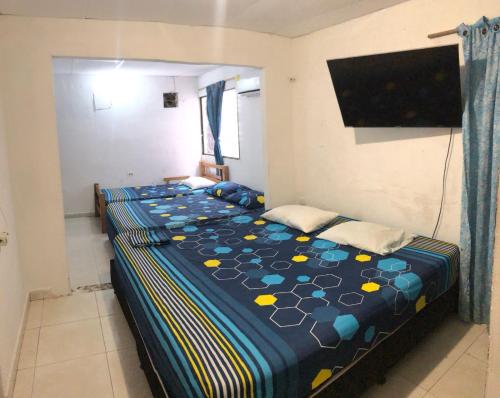 Postel nebo postele na pokoji v ubytování Casa Santorini II