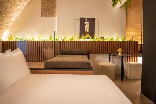 Katil atau katil-katil dalam bilik di Adalina Luxury Suite