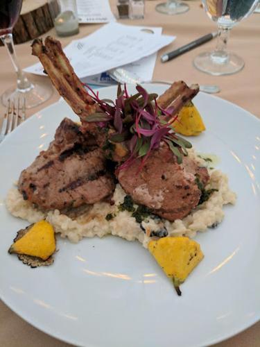 a plate of food with meat and potatoes on a table at Butter milk falls inn in Milton