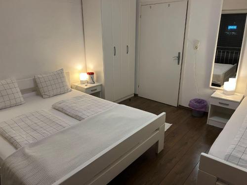 Ένα ή περισσότερα κρεβάτια σε δωμάτιο στο البوسنة