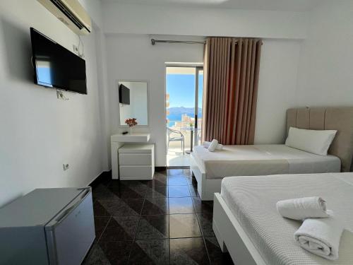 Postel nebo postele na pokoji v ubytování Hotel Oxhaku