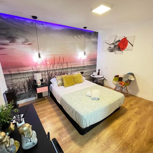 En eller flere senge i et værelse på Habitación loft centro