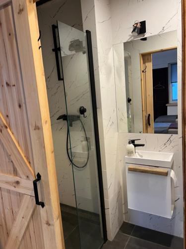 Ένα μπάνιο στο Apartamenty Mazurska 8a