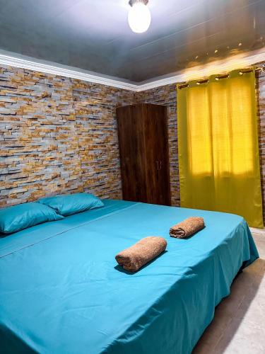 Ένα ή περισσότερα κρεβάτια σε δωμάτιο στο Apartamento GlorySky