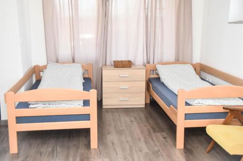 Una cama o camas en una habitación de Voćnjak