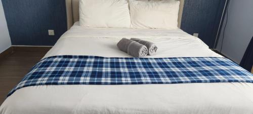 En eller flere senge i et værelse på TroikaHome by JA