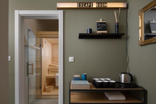 a hallway with a door leading to a bathroom at Olive Hill House - first floor in Slatine