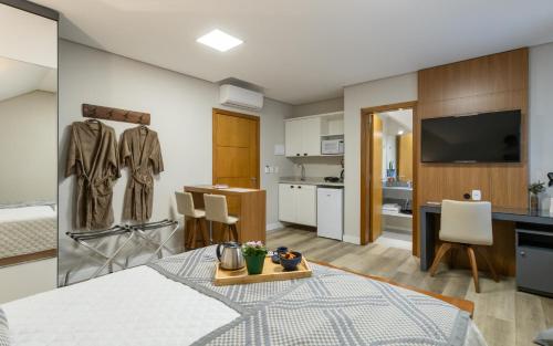 Kuchyň nebo kuchyňský kout v ubytování Villary Flats Gramado
