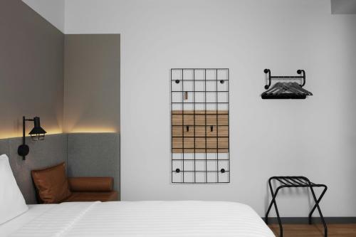 Moxy Istanbul Taksim by Marriott Bonvoyにあるベッド