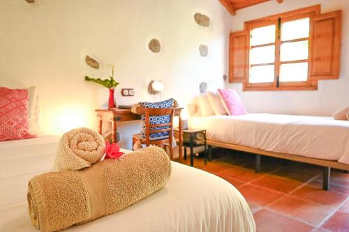 Postel nebo postele na pokoji v ubytování Casa Rural Chamorga - Pensión - Guesthouse -