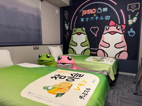 two beds in a room with hello kitty posters at Henn na Hotel Fukuoka Hakata in Fukuoka