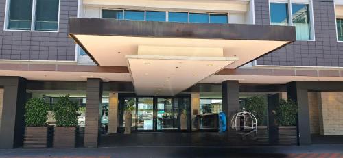 a large building with a large elliptical roof at Marsden Viaduct in Auckland