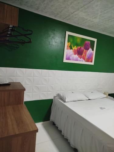 Katil atau katil-katil dalam bilik di HOTEL NOVAES