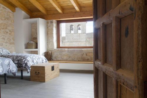 Ένα ή περισσότερα κρεβάτια σε δωμάτιο στο Casa de Laura
