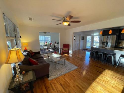 a living room with a couch and a table at Travel Often House in Kennesaw