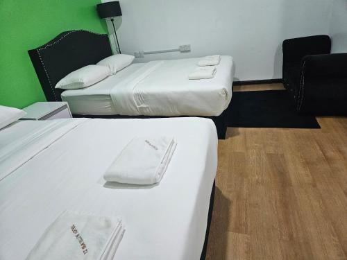 Postel nebo postele na pokoji v ubytování TZ SATELLITE HOTEL, Kota Bharu