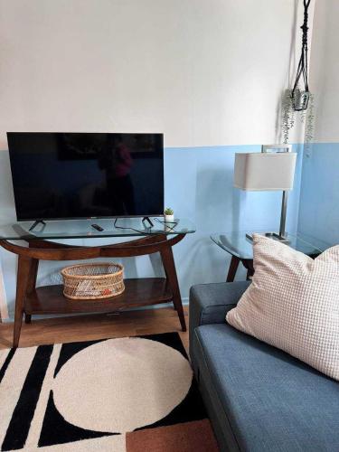 a living room with a couch and a coffee table at Stylish City Base for Groups and Families, Unit #4 in Halifax