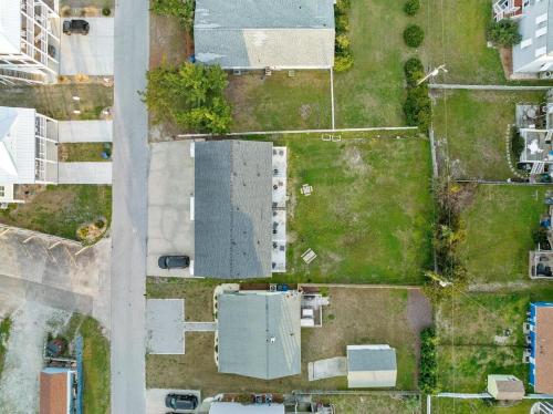 an overhead view of a yard with houses and grass at Anchors Away Unit 4 Duplex in Atlantic Beach
