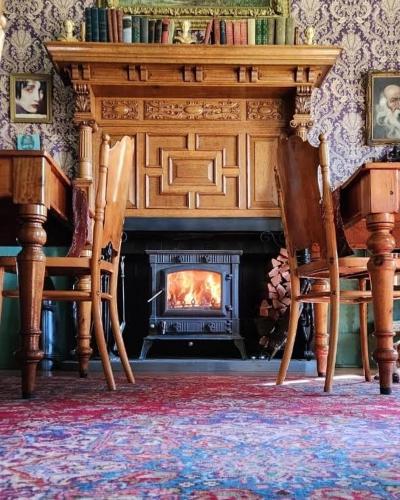Ein Sitzbereich in der Unterkunft Oak View Manor