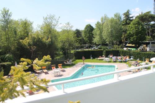 a view of the pool from the balcony of a house at Terme Villa Pace in Abano Terme