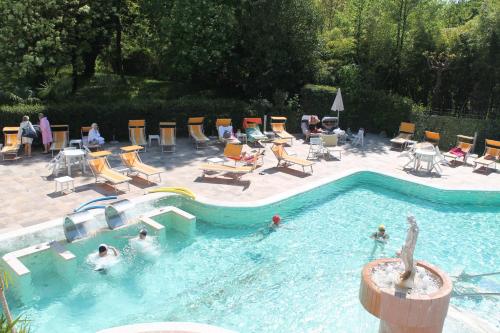 a group of people in a swimming pool at Terme Villa Pace in Abano Terme