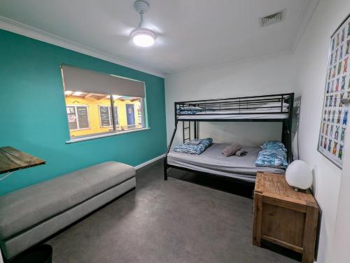 Кровать или кровати в номере Ozzie Pozzie Backpackers