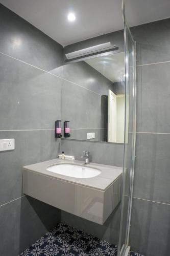 a bathroom with a sink and a mirror at The Shanti A Boutique Hotel in Jodhpur