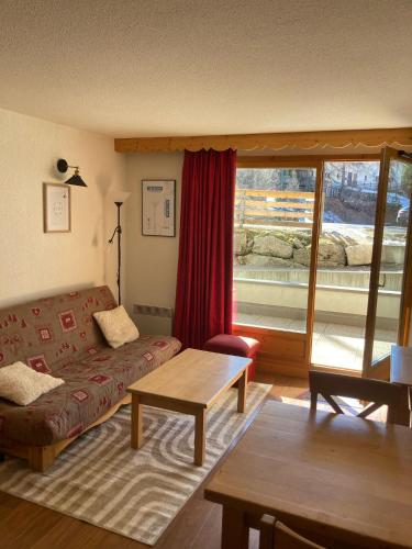 Χώρος καθιστικού στο Bel Appartement lumineux au coeur de la station de Vars