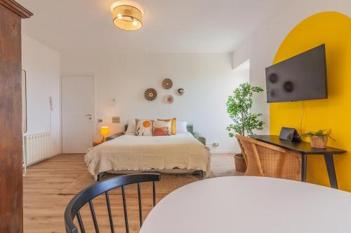 Postel nebo postele na pokoji v ubytování Casa Belvedere Brunate