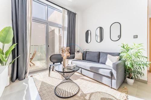 Balcony Offering Community Views 1BR with Assistant Room, Walking Distance to Community Park , Pantheon Elysee , Jumeirah Village Circle by Deluxe Holiday Homes