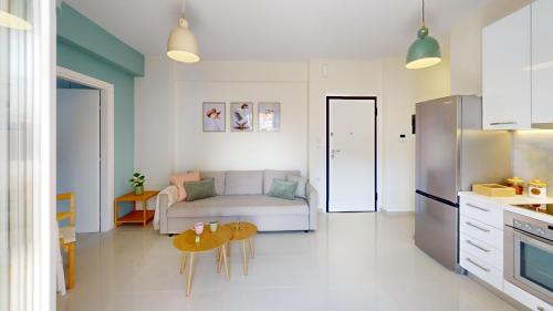 Η κουζίνα ή μικρή κουζίνα στο White Mint Apartment