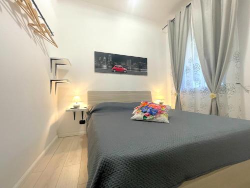 A bed or beds in a room at Casa Sant'Anna