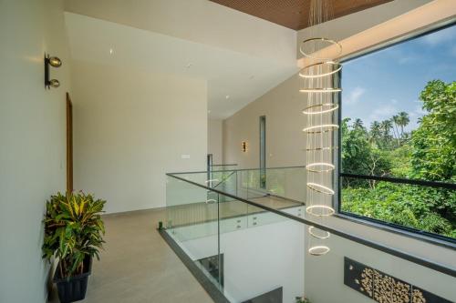Galería fotográfica de Cloud 7 by ELIVAAS Luxurious 4 BHK Villa with Pvt Pool and Jacuzzi en Anjuna