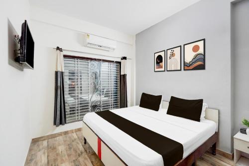 Postel nebo postele na pokoji v ubytování HOTEL BLUEMOON