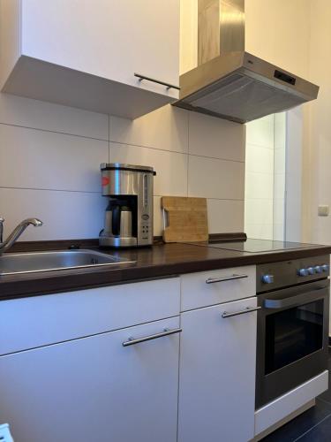 Η κουζίνα ή μικρή κουζίνα στο LIV-IN Lounge Monschau Ferienwohnung