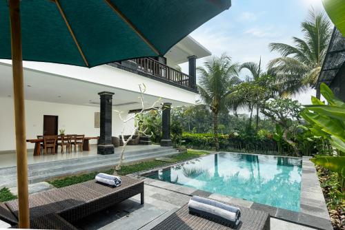Bazén v ubytování The Sakara Ubud Villas by GenuineHost nebo v jeho okolí