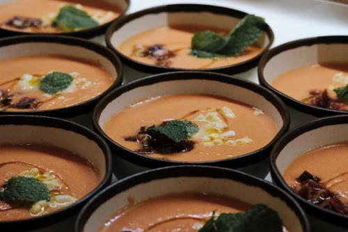 a muffin tin filled with soup with broccoli at Hotel Helios Costa Tropical in Almuñécar