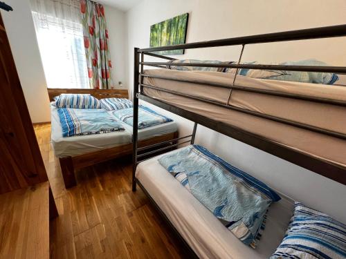 Postel nebo postele na pokoji v ubytování Dünengras