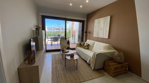 Postel nebo postele na pokoji v ubytování Bahia Soleada