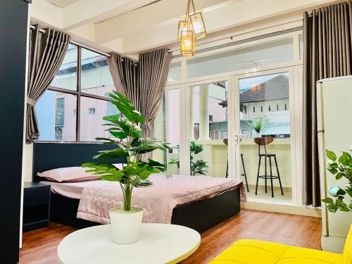 Postel nebo postele na pokoji v ubytování Cali Homestay