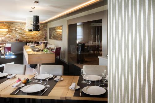 Χώρος καθιστικού στο L'Aubinière Hôtel Restaurant & Spa