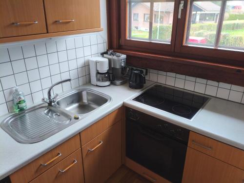 Η κουζίνα ή μικρή κουζίνα στο Beautiful condo with big garden