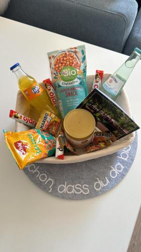 a pile of food on a plate on a table at Ferienwohnung in der Papenburger Stadtmitte in Papenburg