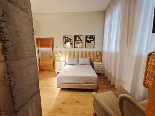 Ένα ή περισσότερα κρεβάτια σε δωμάτιο στο Gernika Suites by Aldori - New Opening !!