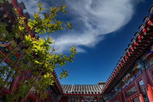 a roof of a building with a blue sky at Peking Courtyard Qianmen in Beijing