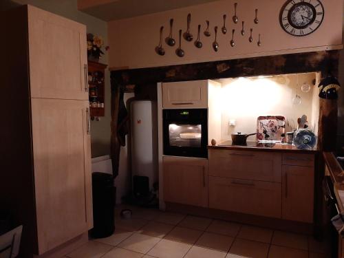 Kuchyň nebo kuchyňský kout v ubytování House with good energy