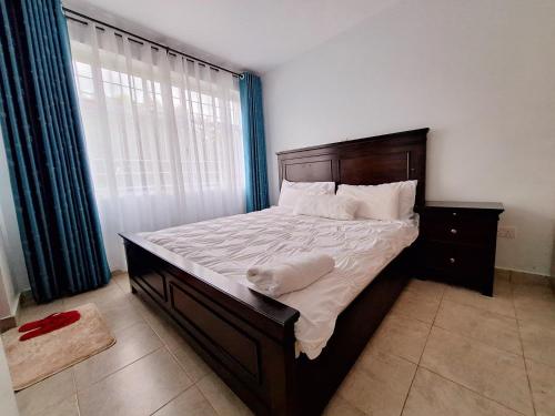 Postel nebo postele na pokoji v ubytování Bellissima Homes