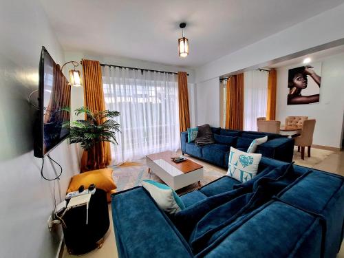TV a/nebo společenská místnost v ubytování Bellissima Homes