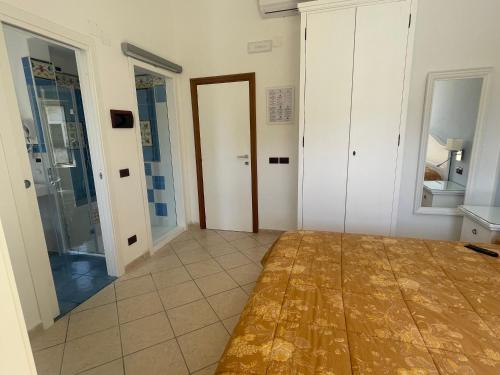 Postel nebo postele na pokoji v ubytování Hotel Ristorante Colleverde