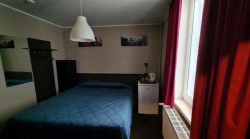 Postel nebo postele na pokoji v ubytování Center Elite